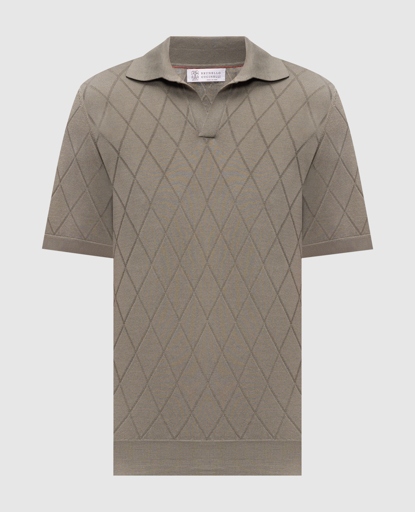 Green polo shirt with geometric pattern