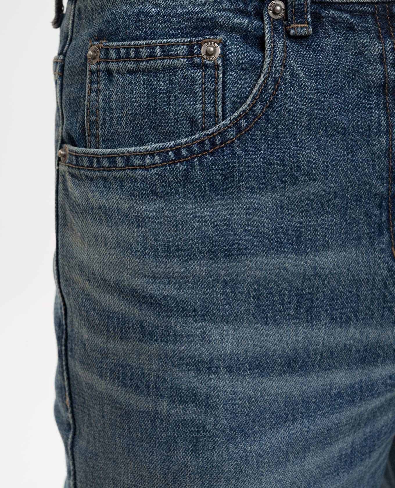 

Blue flared jeans with a distressed effect Juun.j