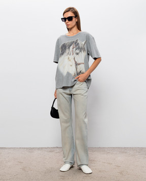 Maison Margiela MM6 Blue jeans with a worn effect S62LB0223M30055