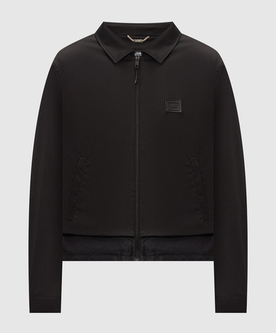 Black jacket with logo patch