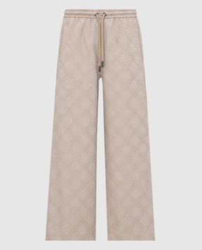 Off-White Beige pants with a logo pattern 44MCA28UF26F001