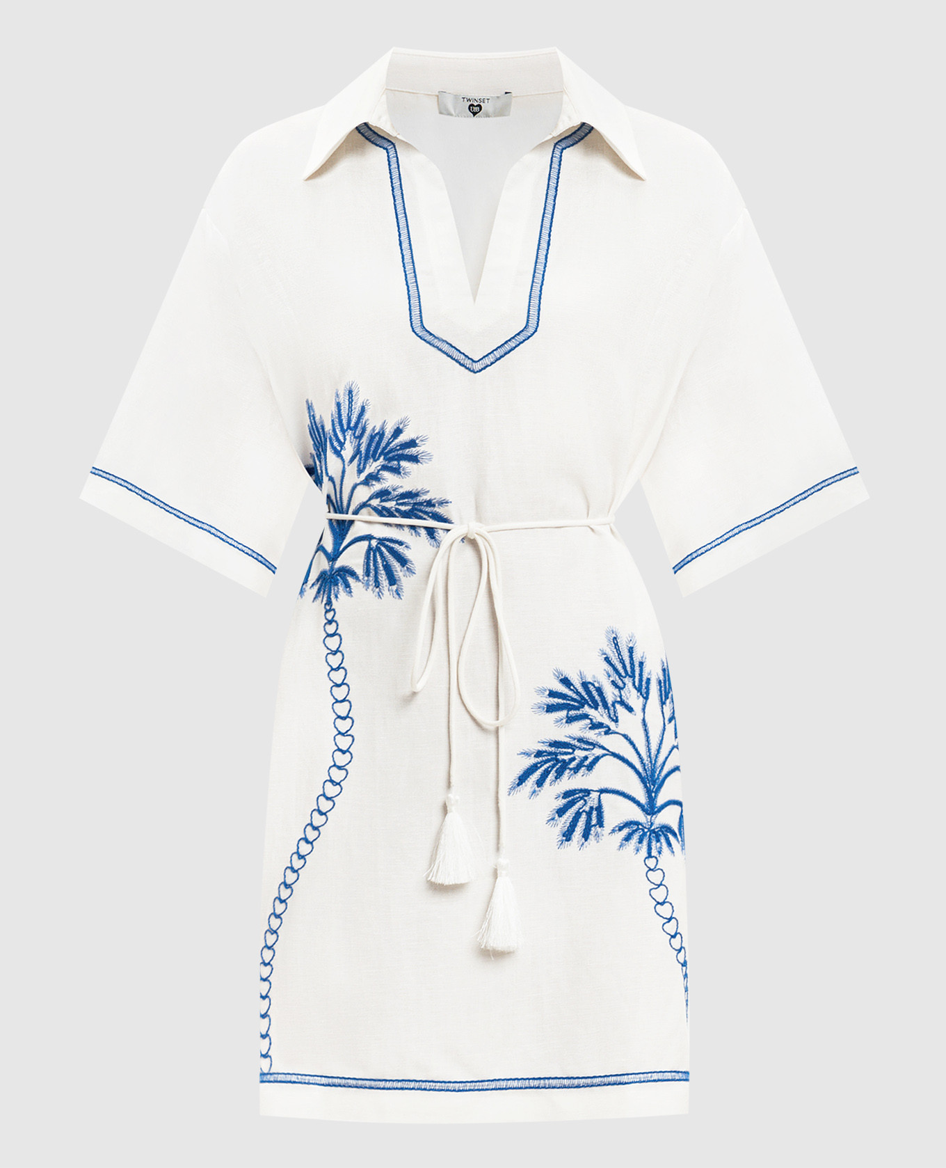 White linen dress with contrasting embroidery