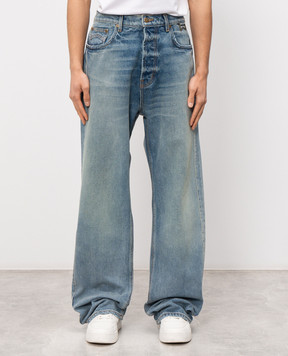 Rhude TRAXEDO blue jeans with a worn effect RHPS26DP02012