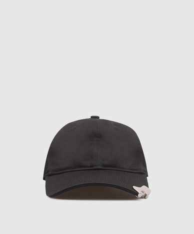 Black cap with built-in bottle opener