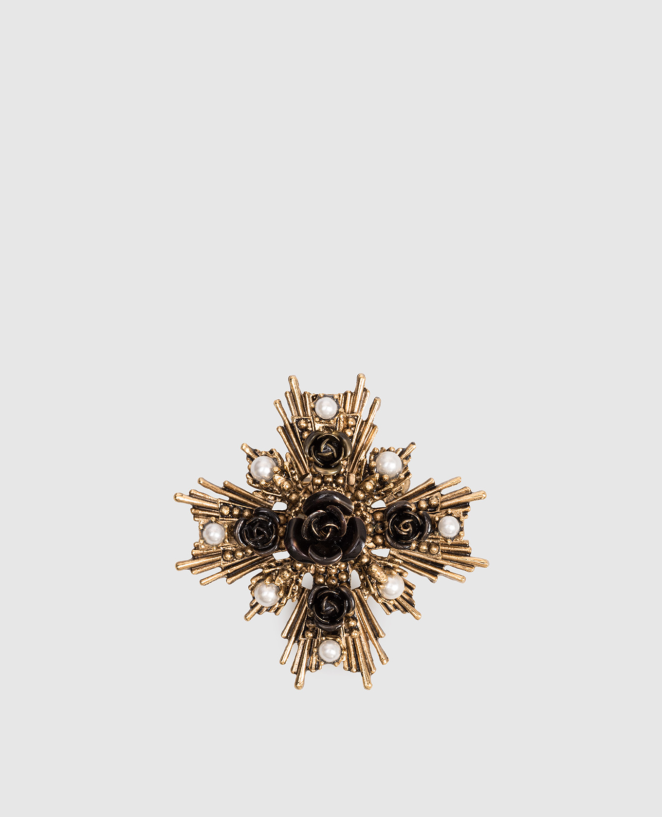 

Golden brooch with textured roses CelesteG