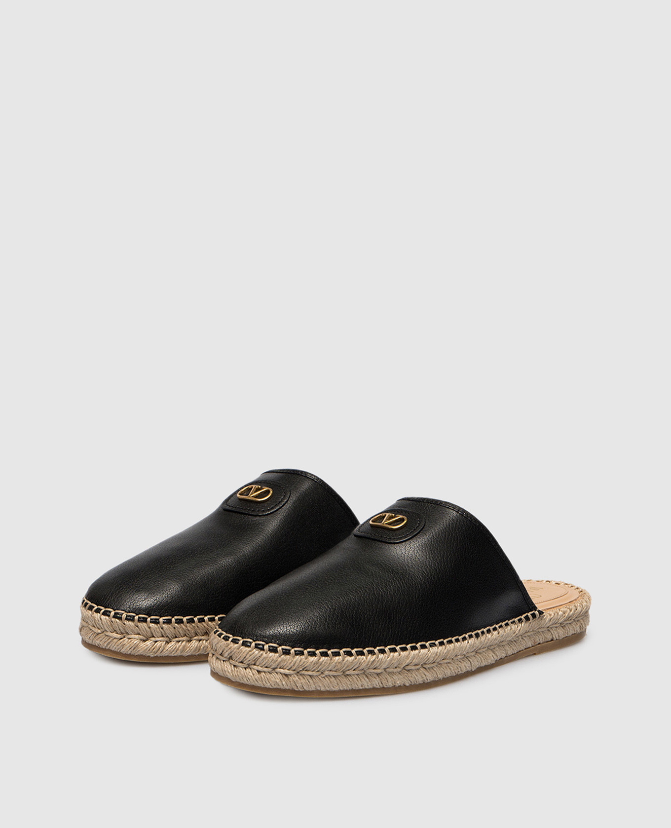 

Black leather mules with logo Valentino