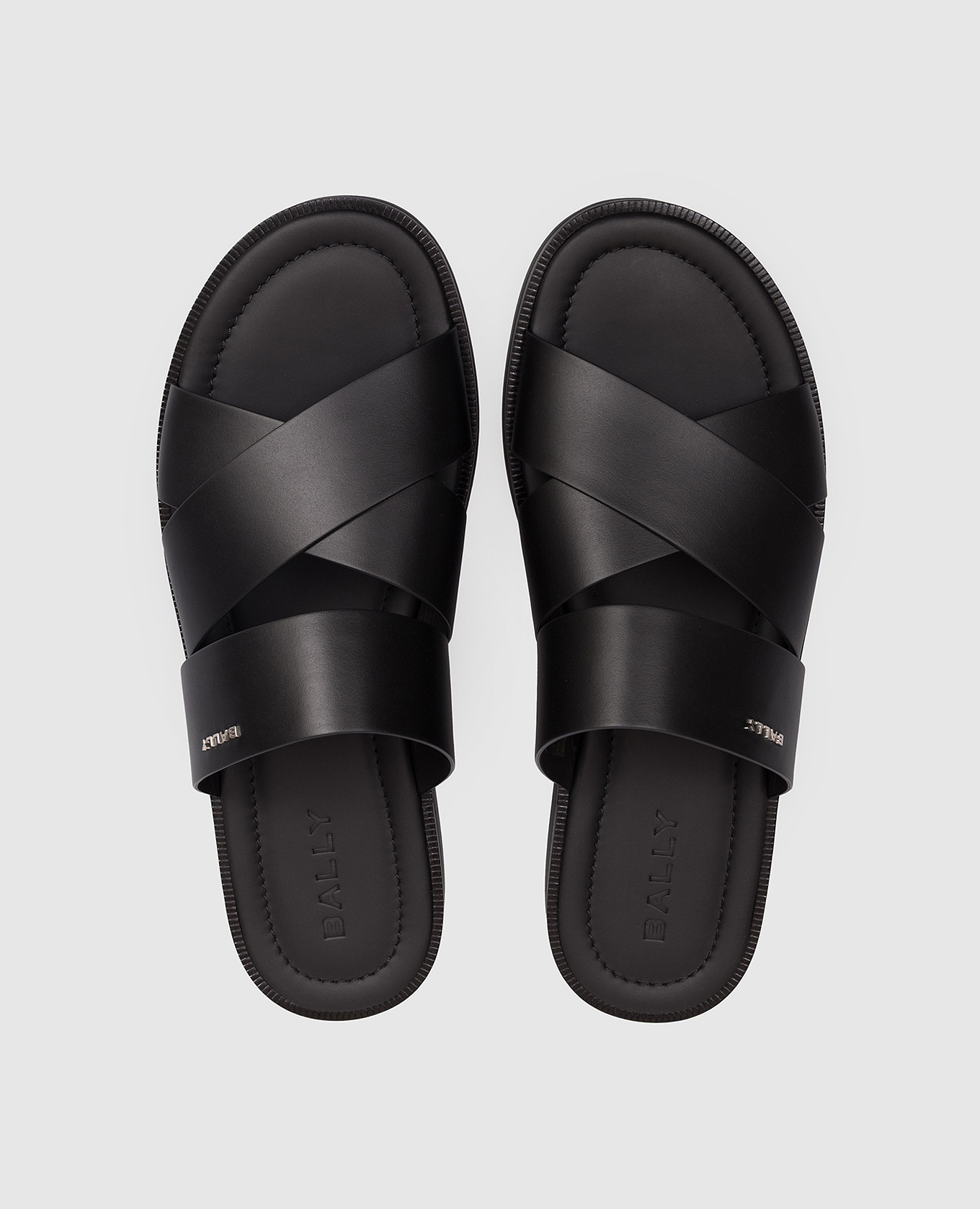 

Black leather flip-flops with textured logo Bally