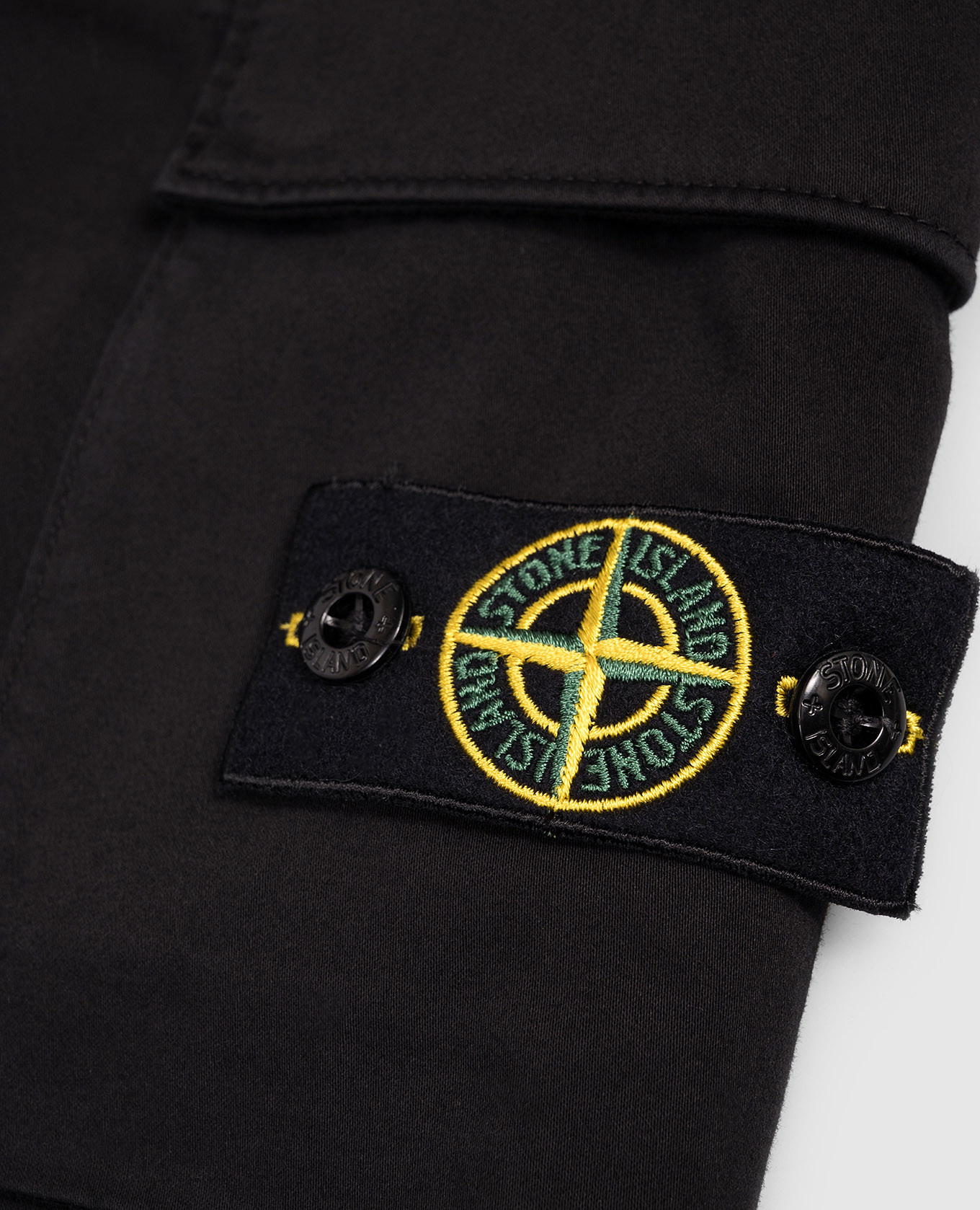 

Kids' black joggers with logo Stone Island