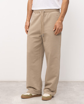 Ami Paris Beige sweatpants with emblem UTR855747m