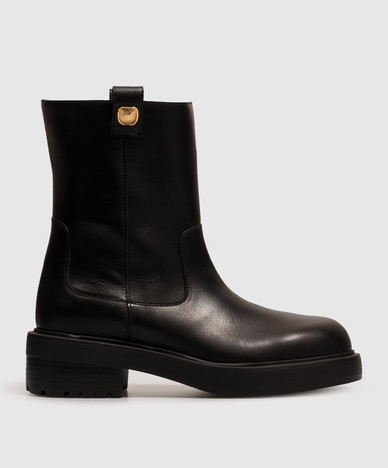 Black leather boots with branded patches