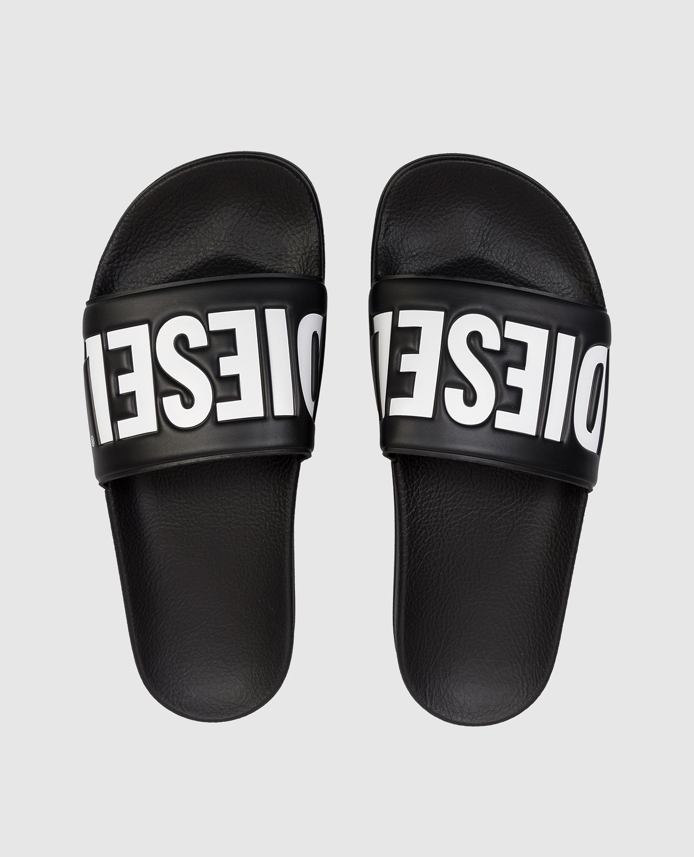 

Children's black sliders with embossed logo Diesel
