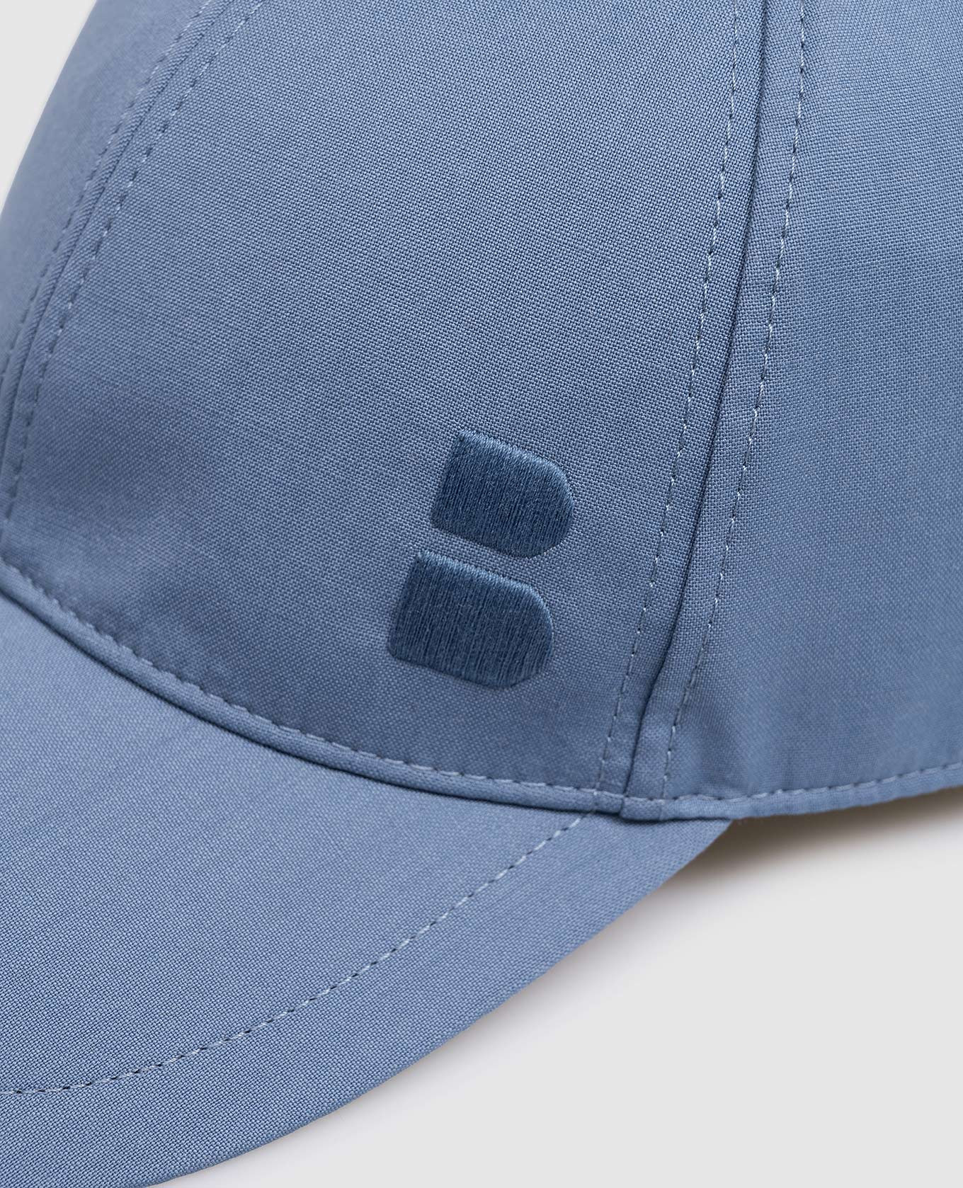 Blue wool cap with emblem Brett Johnson 4