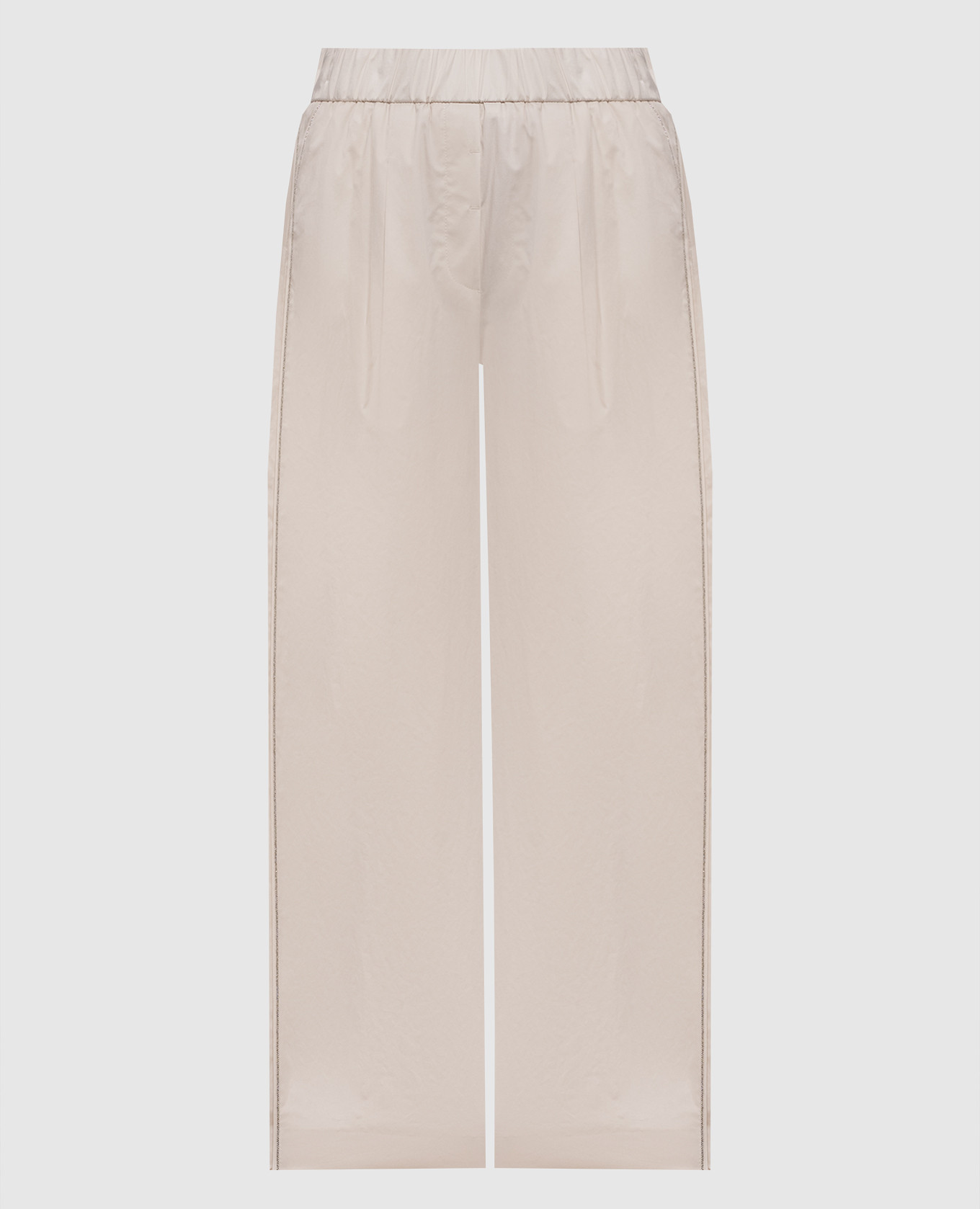 Beige pants with a monil chain