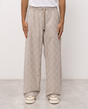 Off-White Beige pants with a logo pattern 44MCA28UF26F001