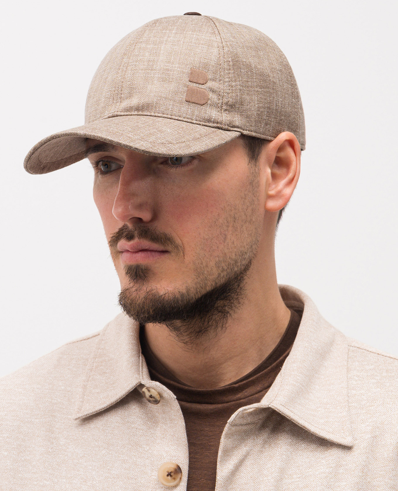 

Brown wool, silk and linen patterned cap Brett Johnson