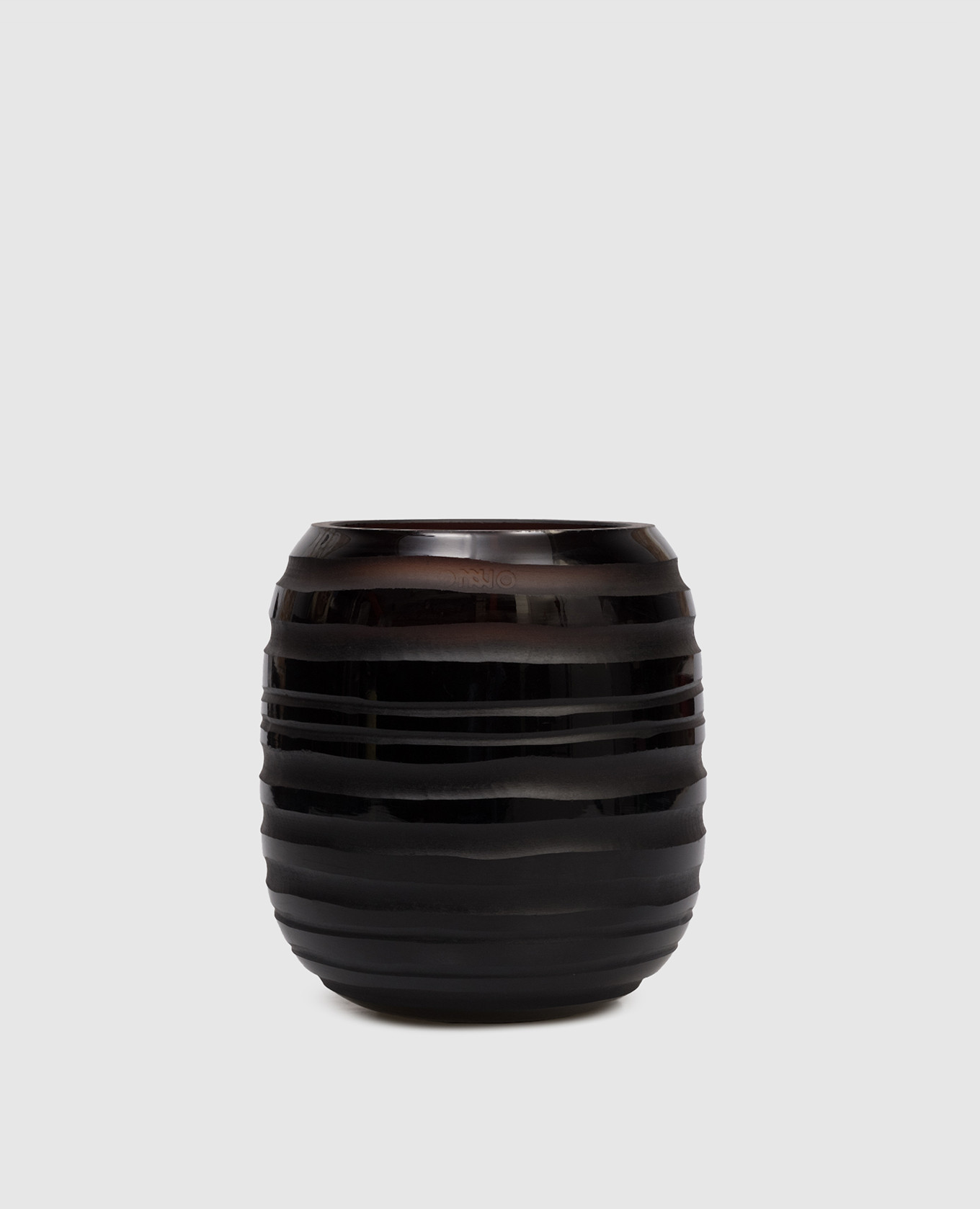 

Sphere Amber  candle with Zanzibar scent in a glass candle holder Onno, Brown