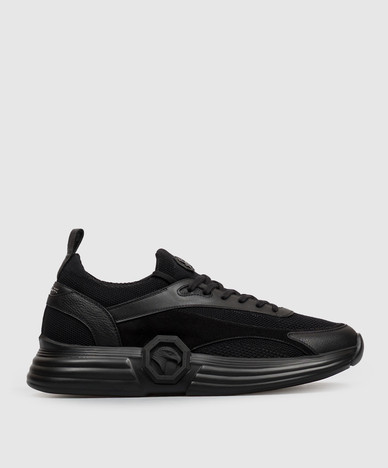 Black combination sneakers with textured monogram logo