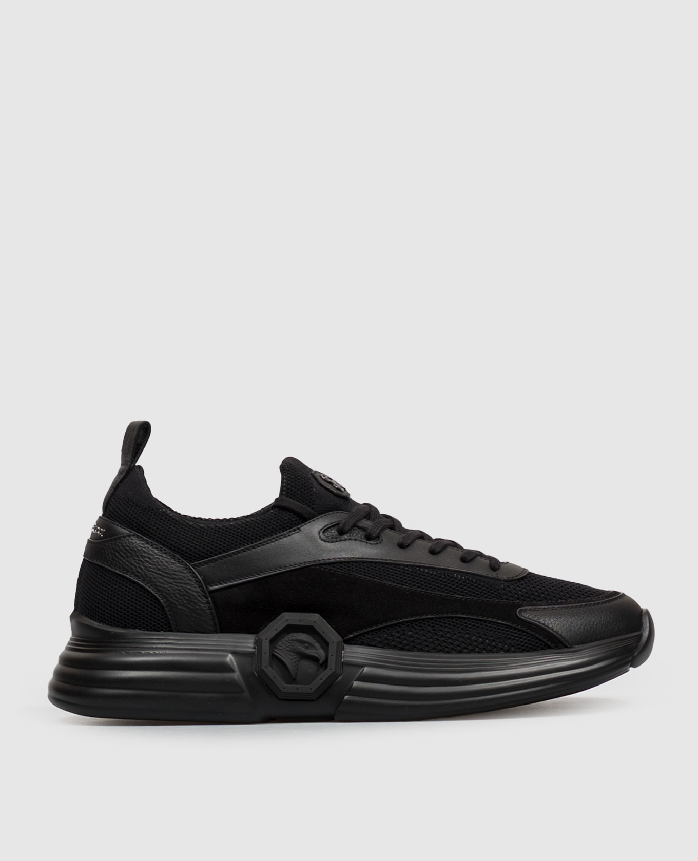 Black combination sneakers with textured monogram logo