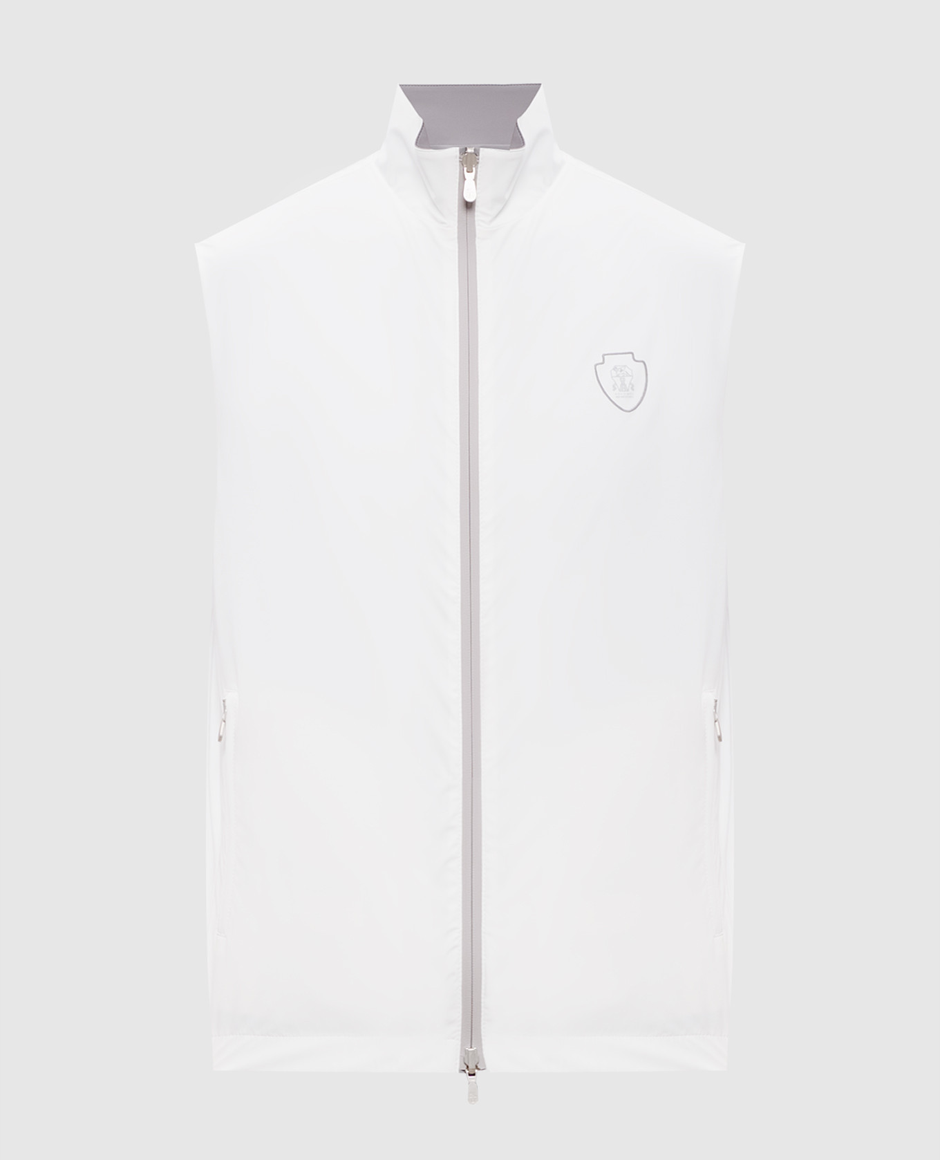 Reversible vest with embroidered emblem
