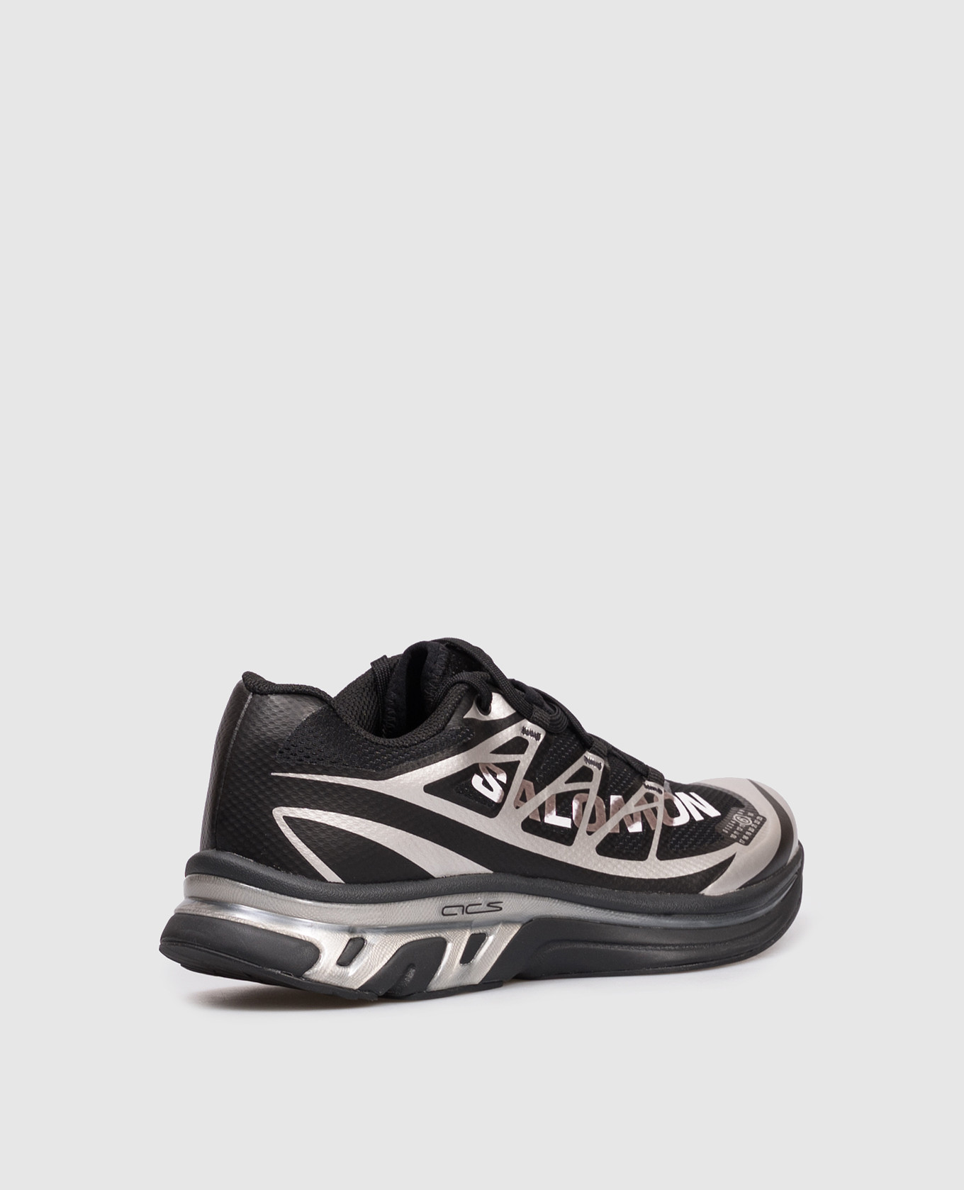 

Black sneakers with emblem Maison Margiela MM6