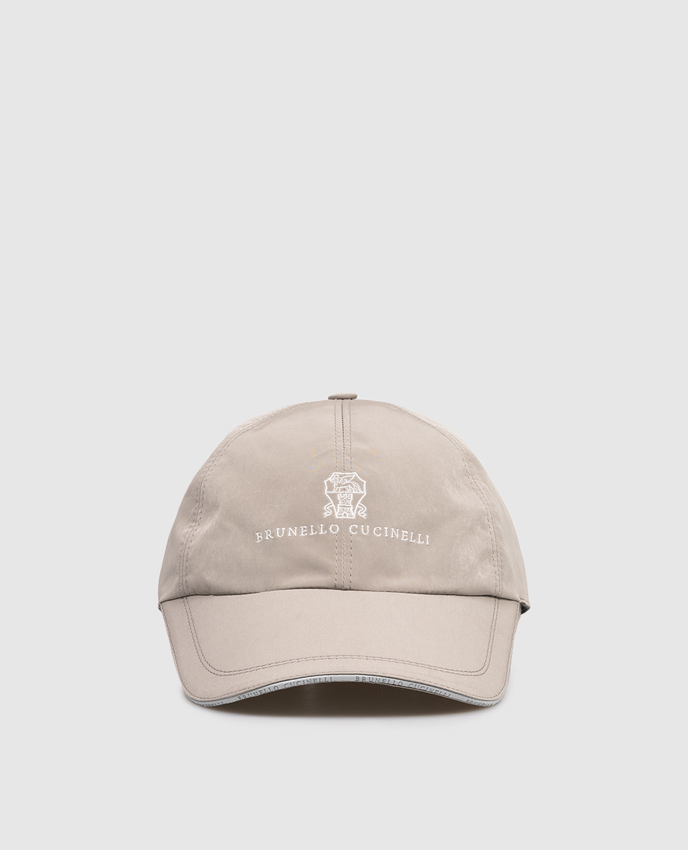 Khaki cap with embroidered emblem