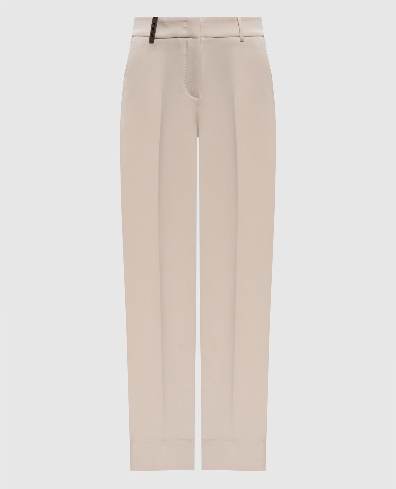 Beige pants with a patch