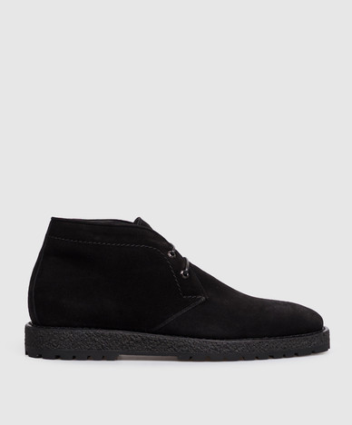 Brown suede deserts on fur