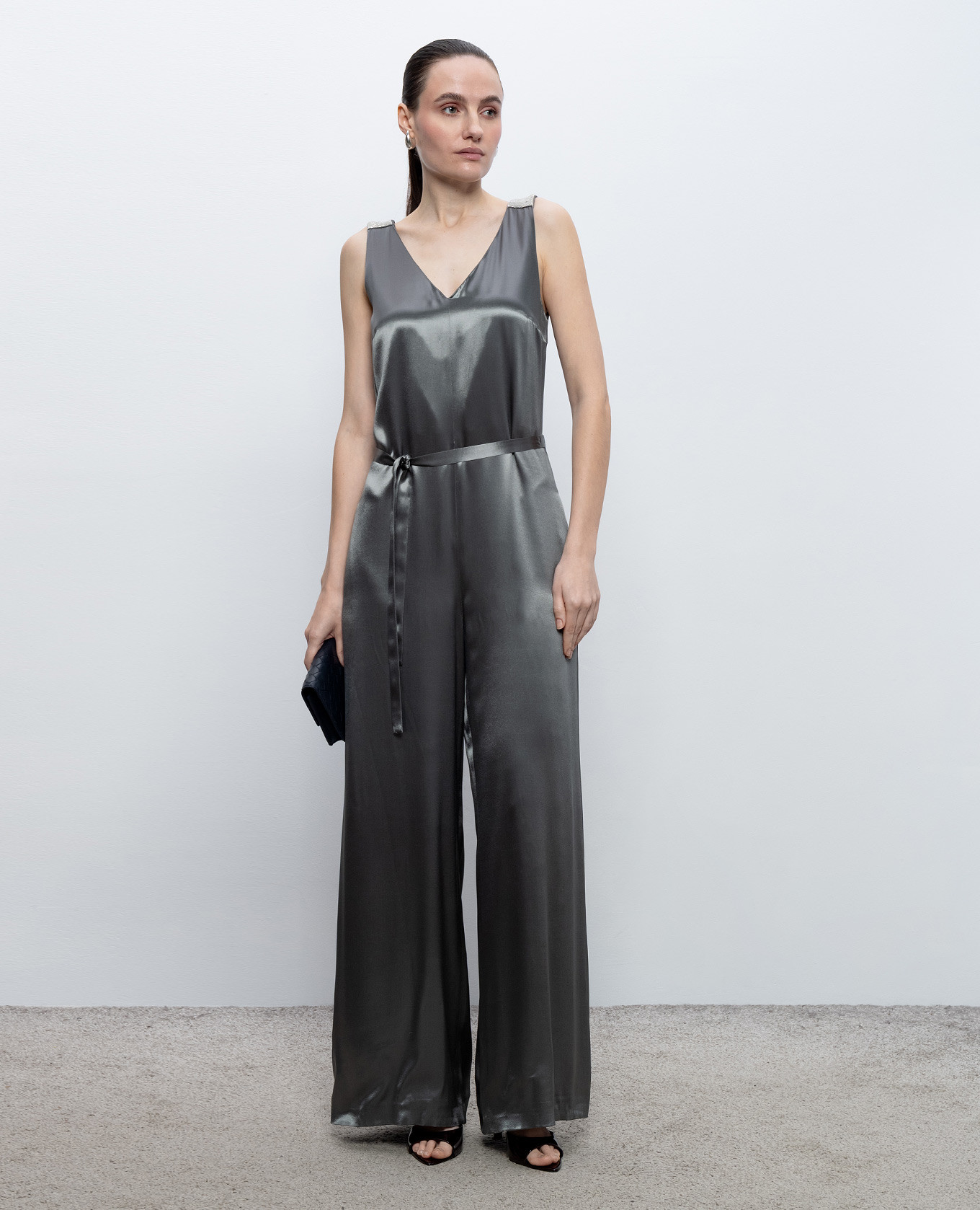 

Green jumpsuit with monil chain Peserico