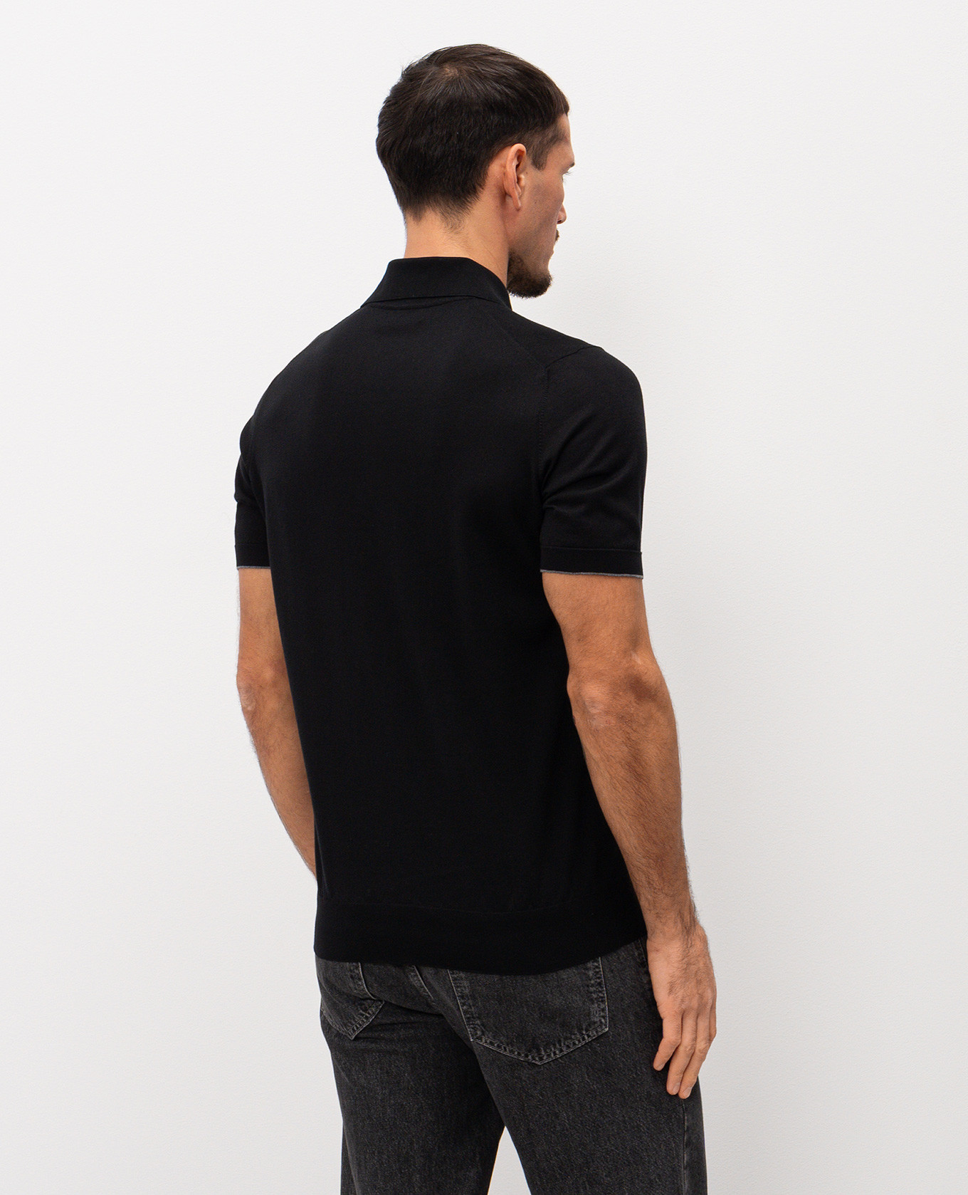 

Black polo shirt with embroidered emblem Brunello Cucinelli
