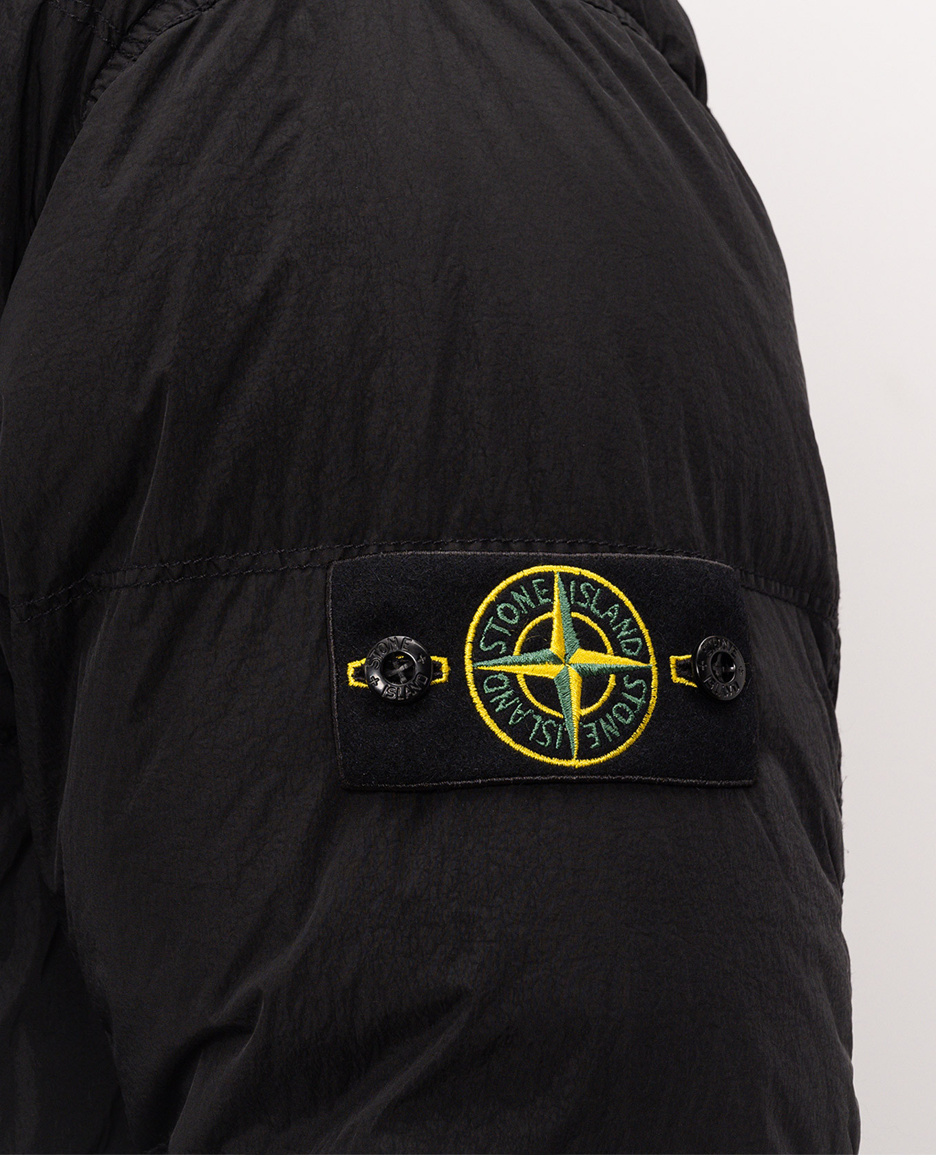 Black down jacket with logo patch Stone Island 5
