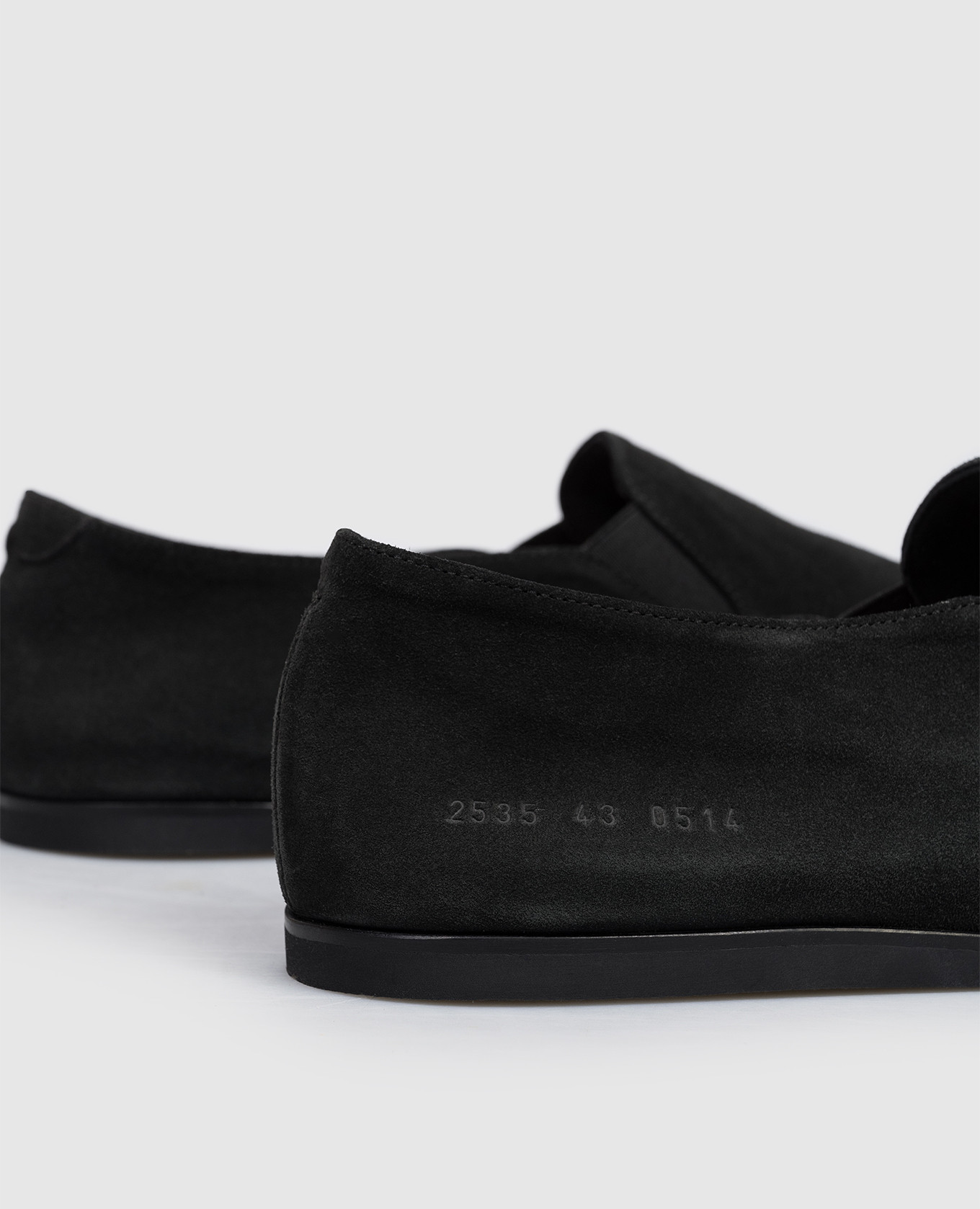 

Black suede slip-ons Common Project