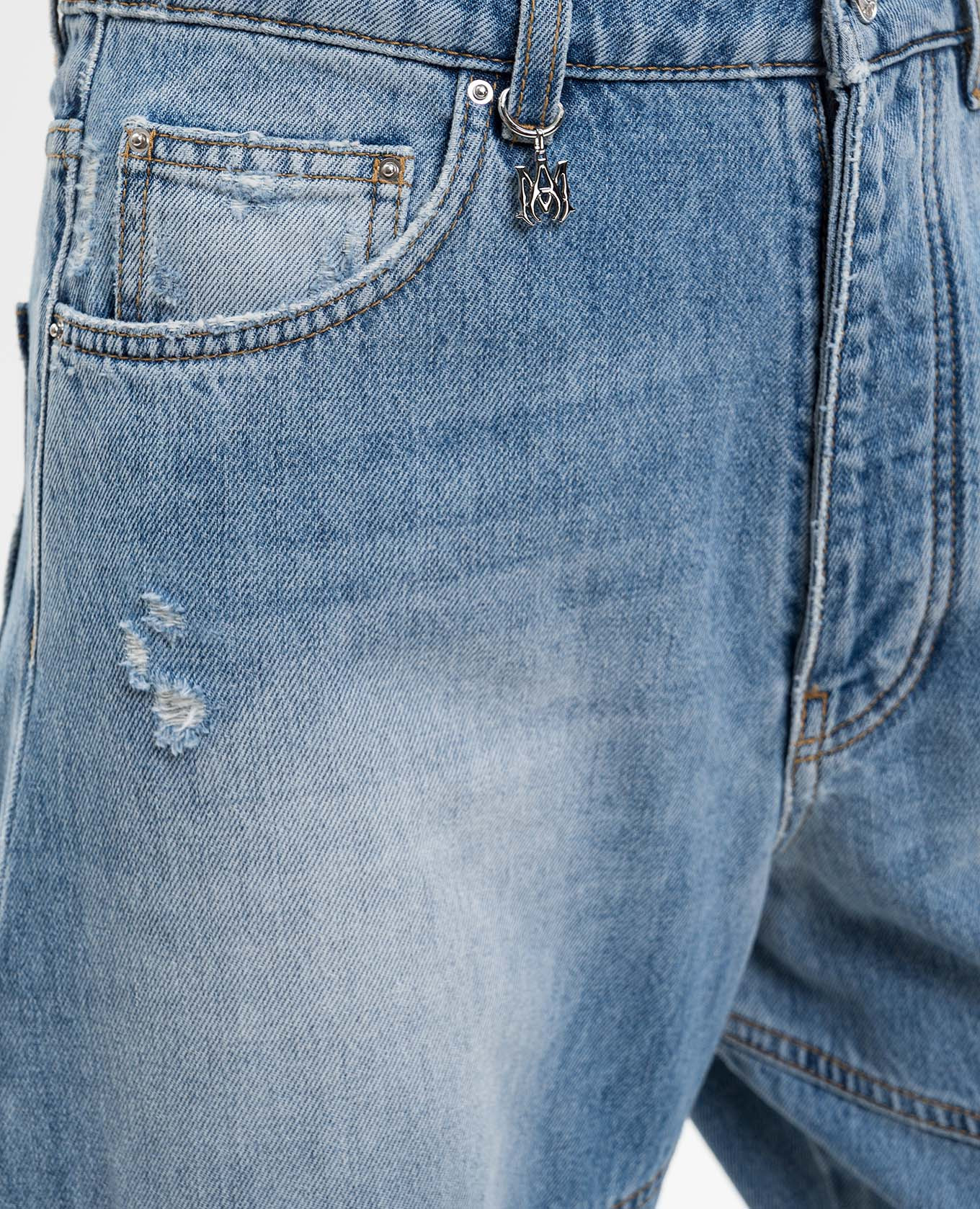 Blue banana jeans with a frayed effect AMIRI 5