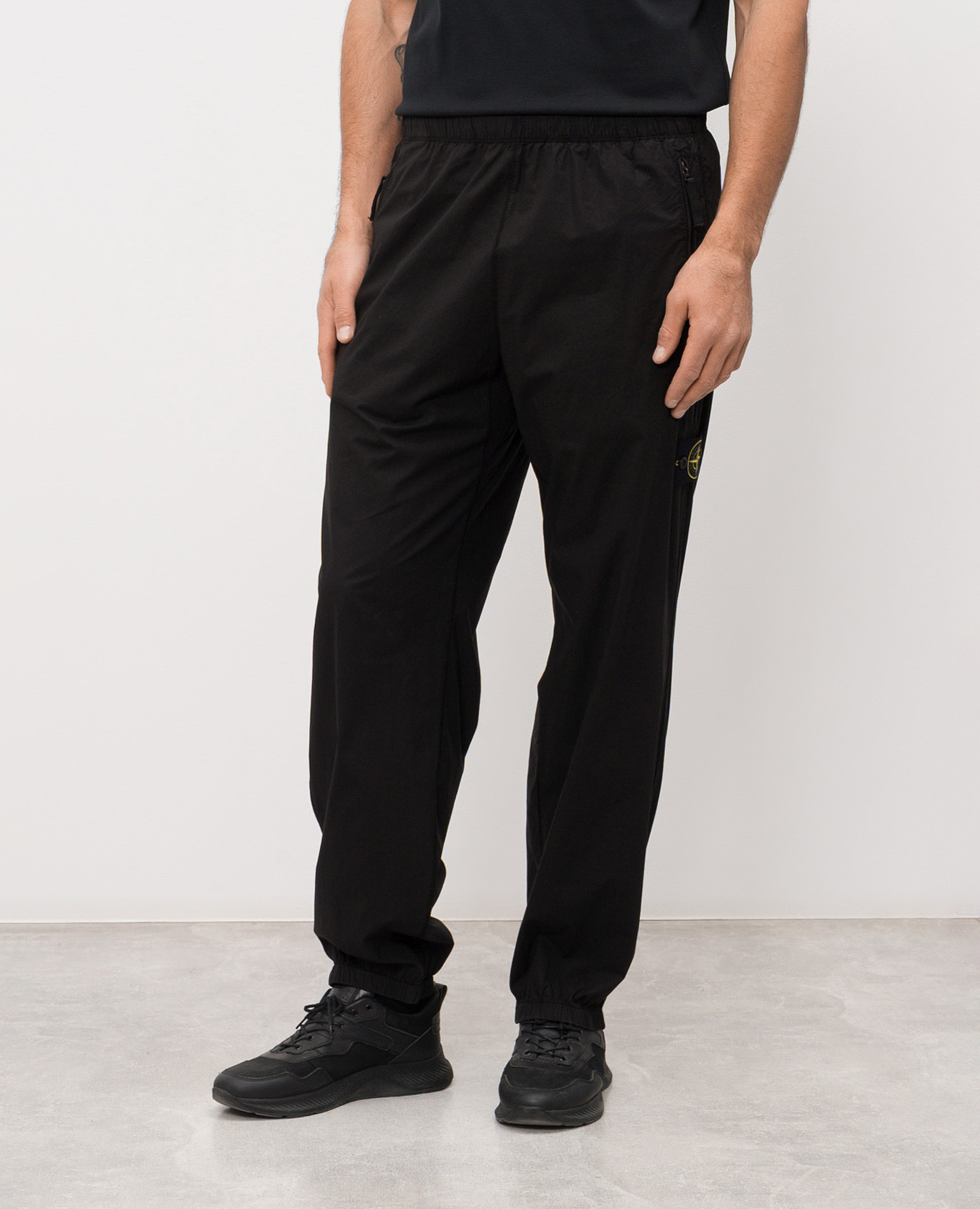 

Black joggers with logo patch Stone Island