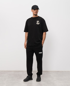Comme des Fuckdown Black joggers with logo print FMS6CFABM01914