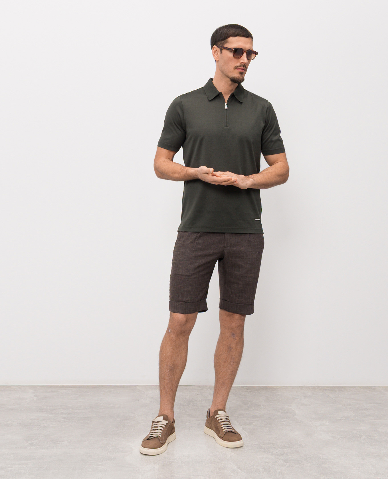 

Green polo shirt with logo patch Enrico Mandelli