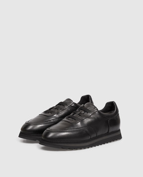 Doucal's Black leather sneakers with fur trim DU3316WINNUN281