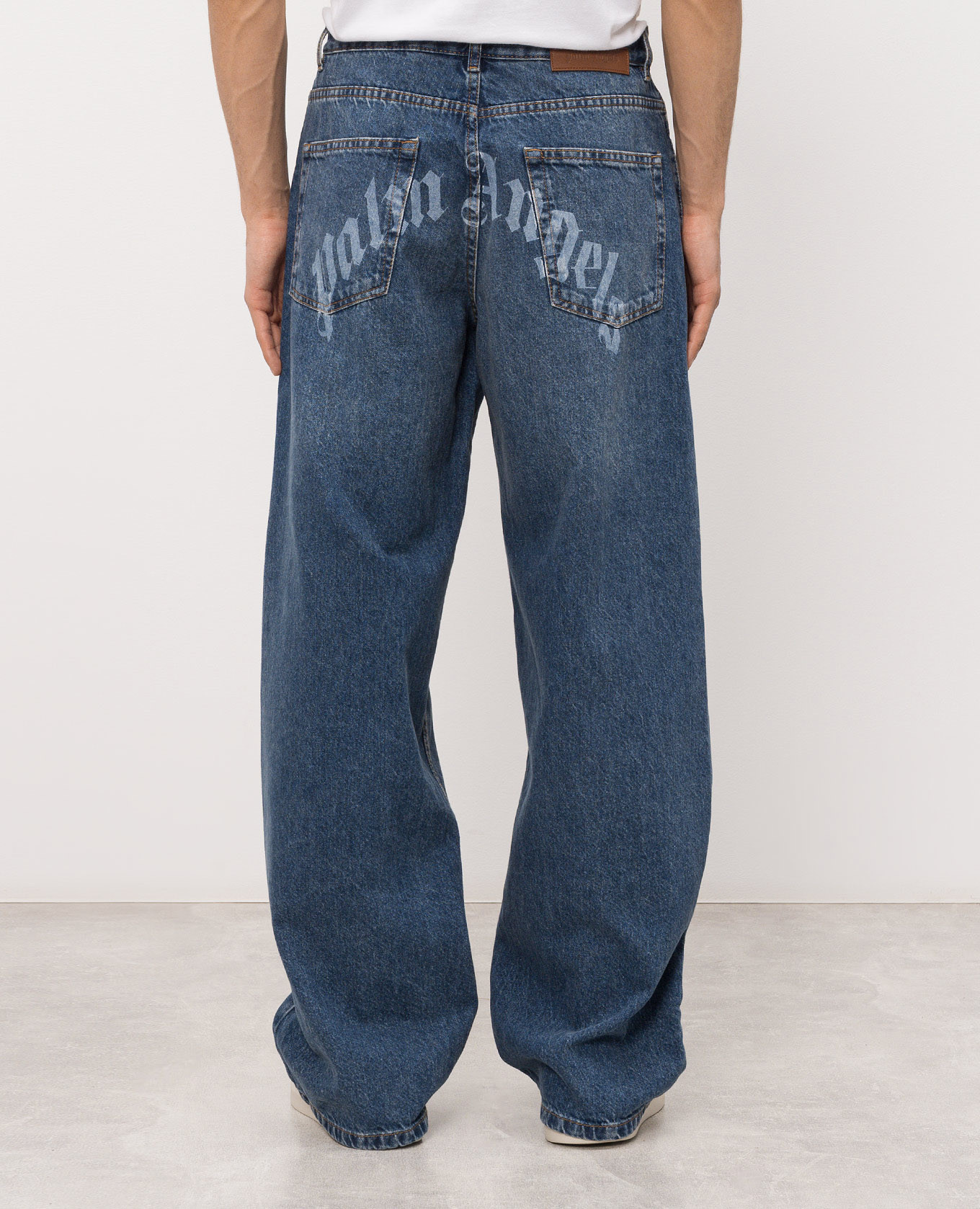 

Blue jeans with logo print Palm Angels