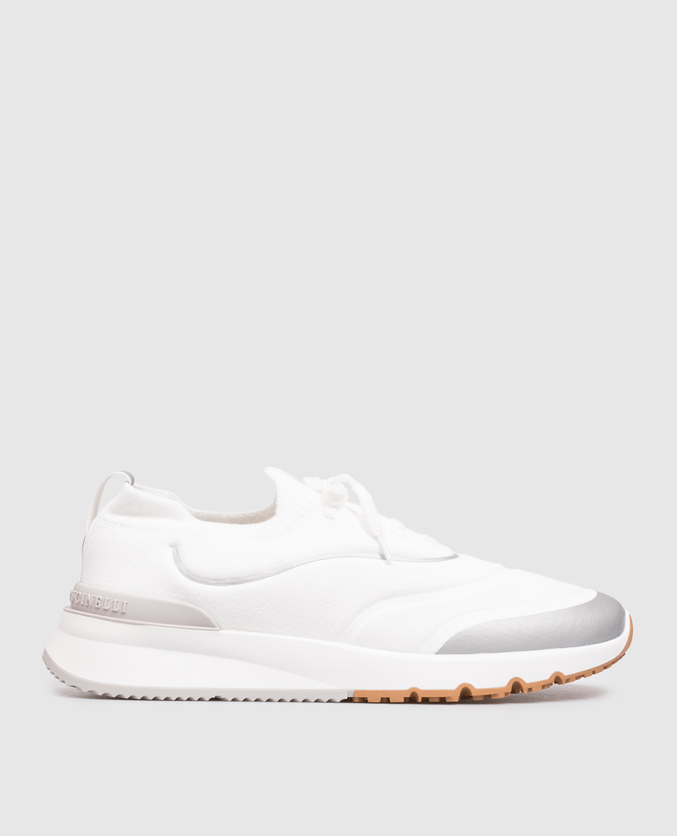 White cotton sneakers with textured logo