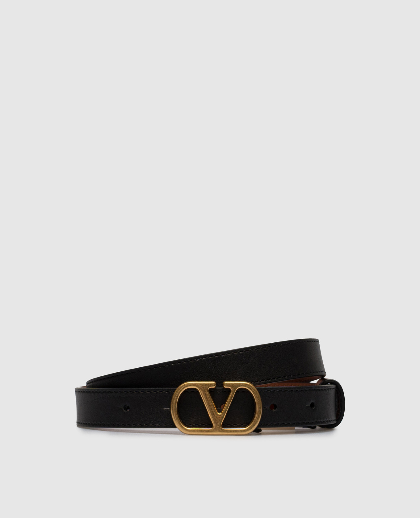 Reversible leather belt with emblem