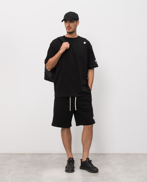 Comme des Fuckdown Black T-shirt with embroidered emblem FMS6CFABM01981