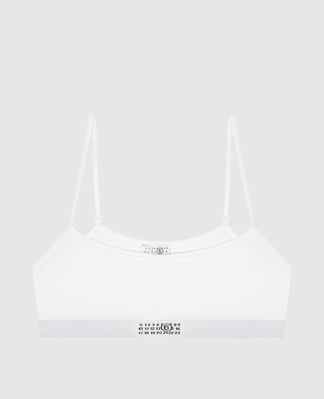 White top with emblem