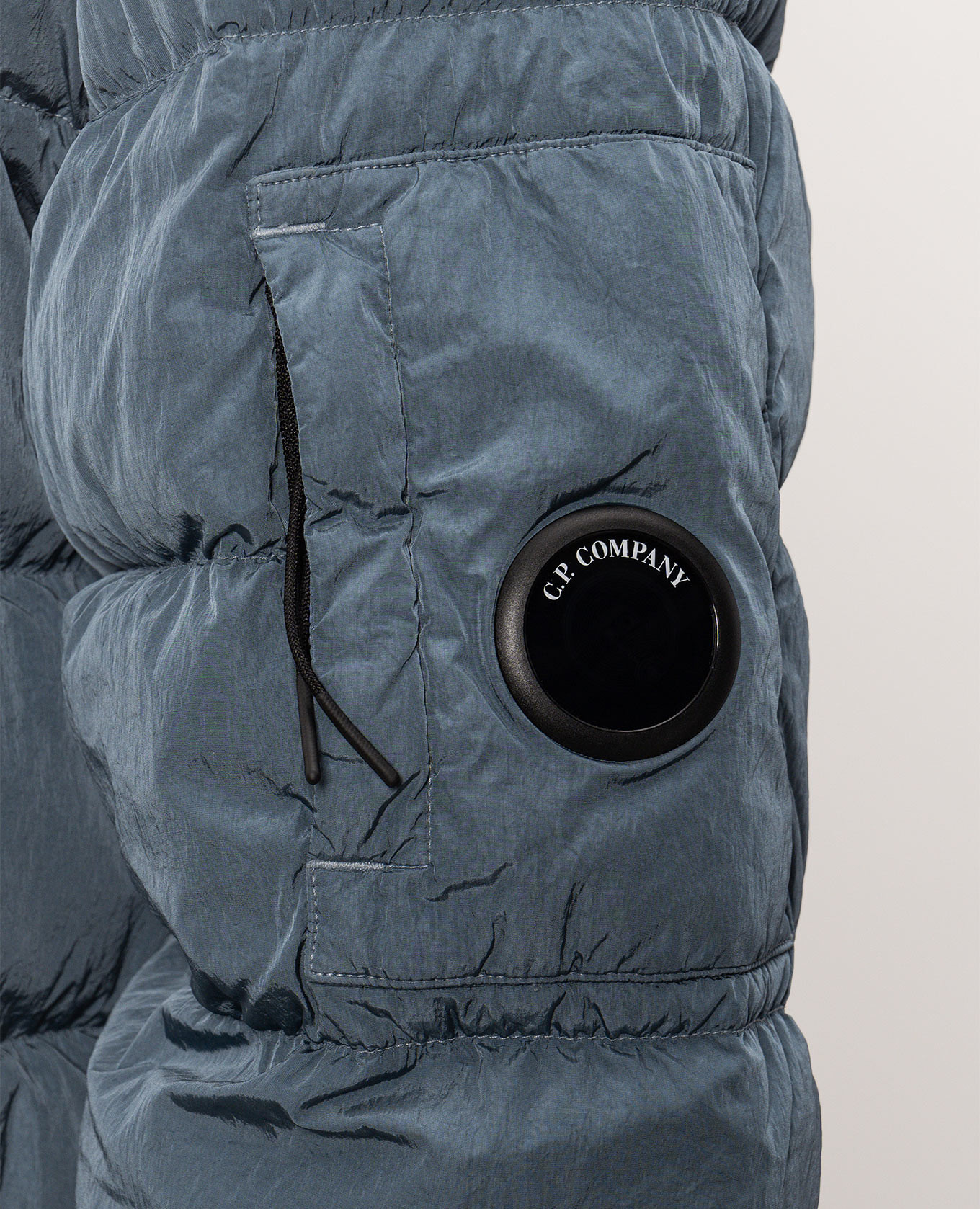 Blue down jacket with logo patch C.P. Company 5