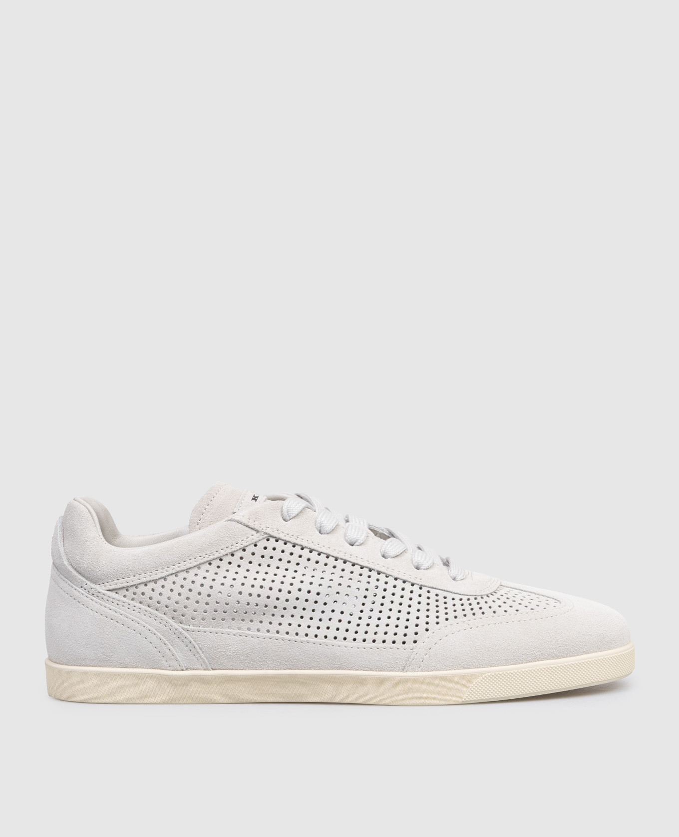 Grey suede sneakers with perforations