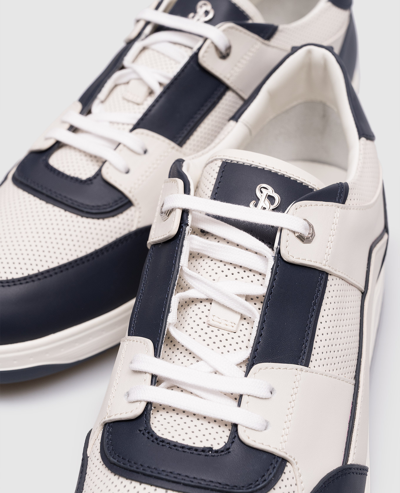 

White leather sneakers with monogram Stefano Ricci