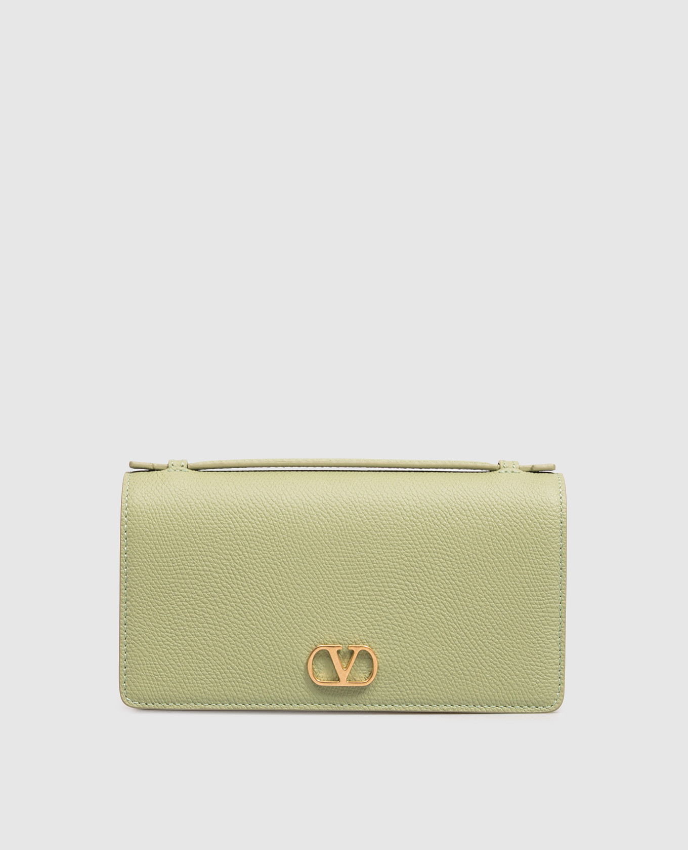 Green leather clutch