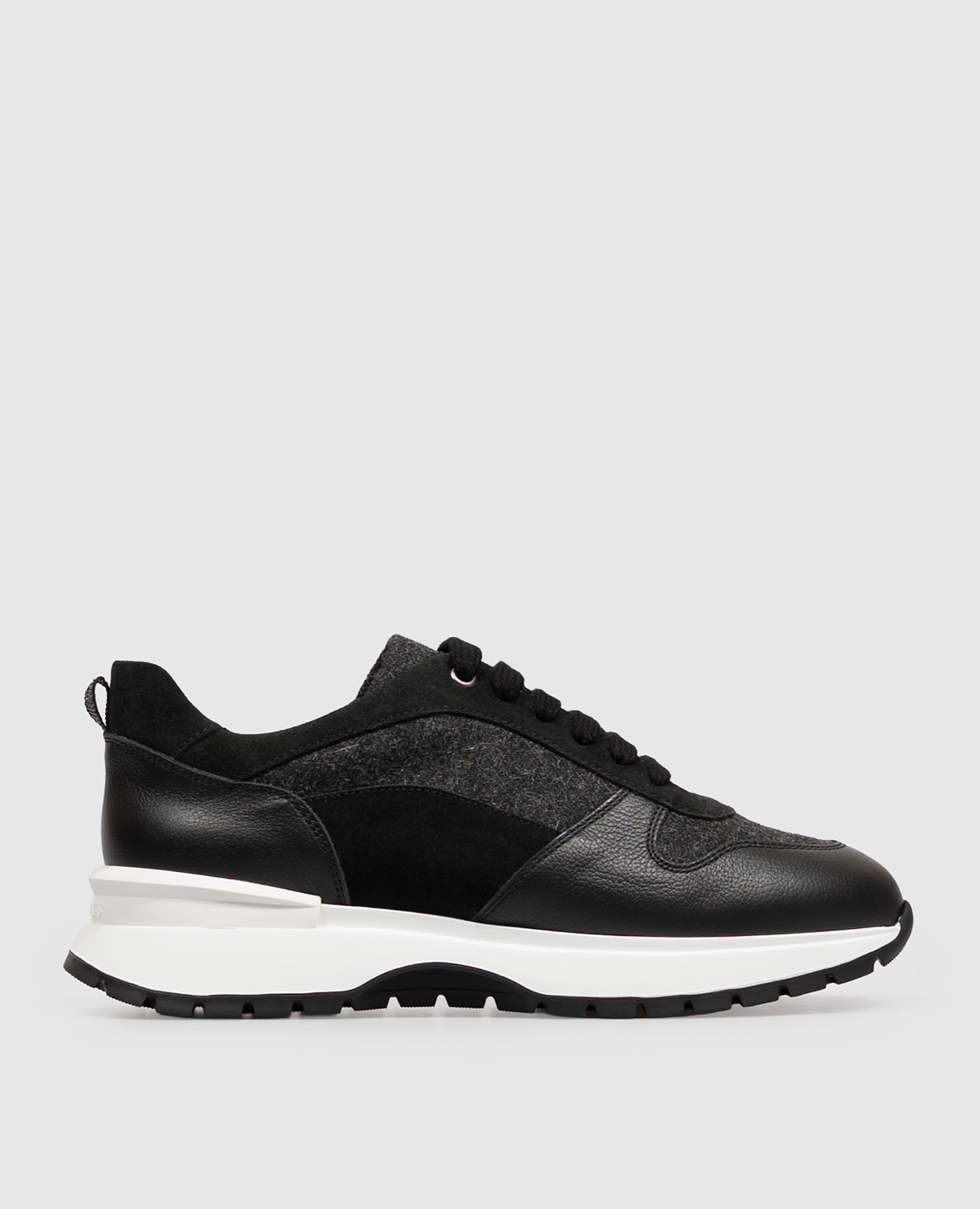 Black combination sneakers with textured logo