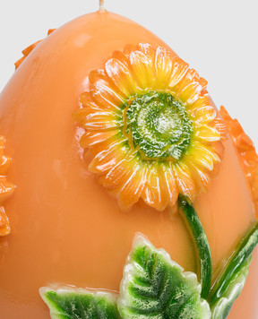 Cereria Introna Orange egg-shaped candle with gerbera 1143
