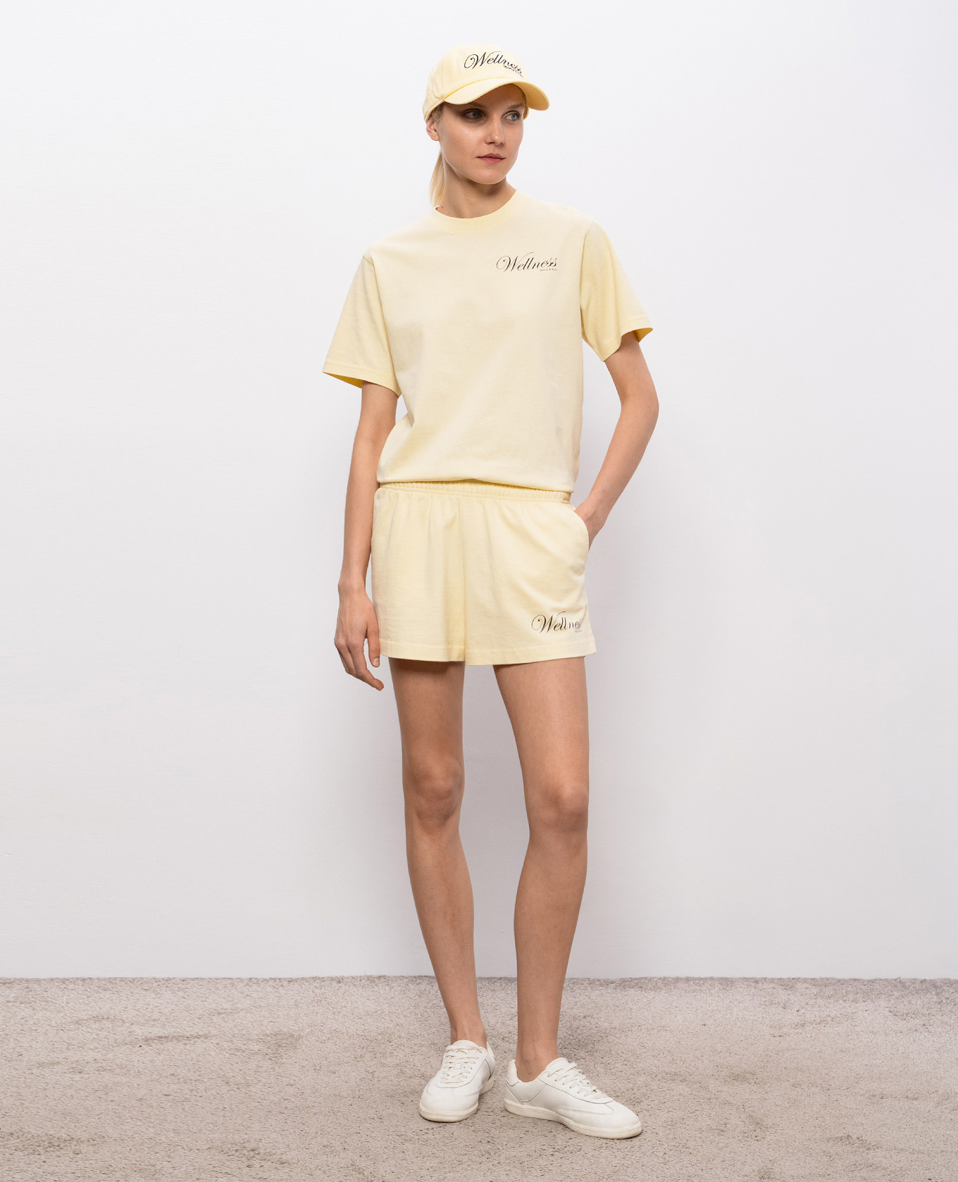 

Avenue Disco yellow shorts with contrast print Sporty & Rich