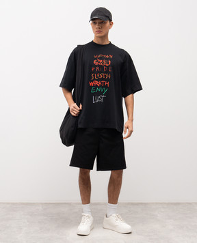 Vetements Black T-shirt with printed lettering and embroidered logo ME76TR196BXm