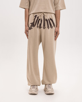 Palm Angels Beige joggers with logo print PMCH025S26FLE003